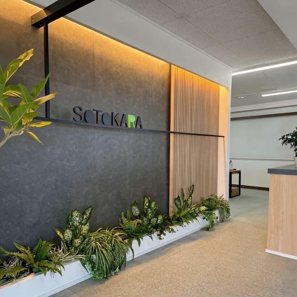 Concrete and Wood Slat Office Entrance Logo Wall with Linear Planter